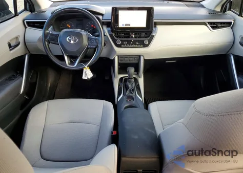 2023 Toyota Corolla Cross Le z USA, uszkodzony, nr VIN 7MUCAAAG6PV040981